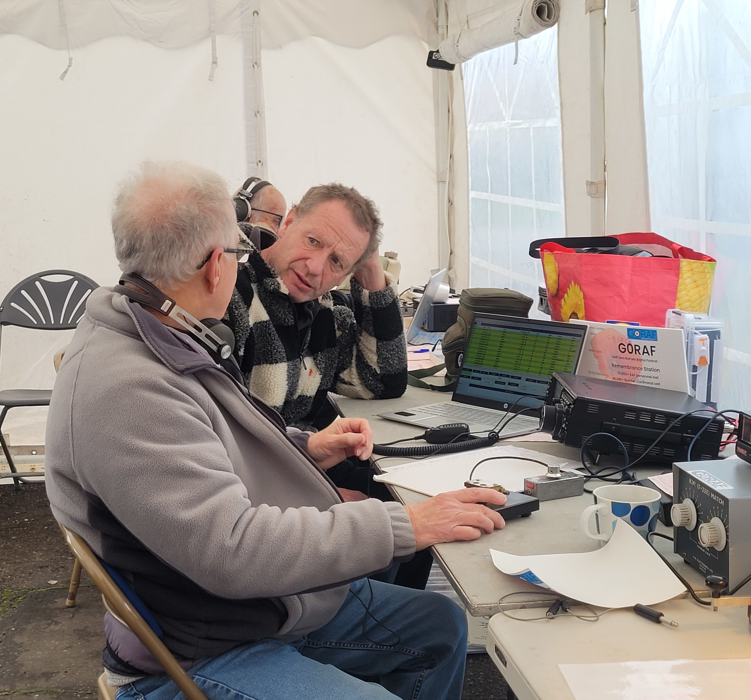 Brian, G4HIV and Andy, M0IYE in charge of the HF CW station on Sunday morning, with Chris, 2 E 0 B M A chasing 2m contacts